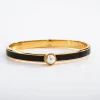 Halcyon Days Cabochon Pearl, Black & Gold Hinged Skinny Bangle- Bracelets & Bangles